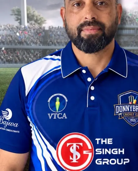Jitender Singh in the club's blue playing shirt