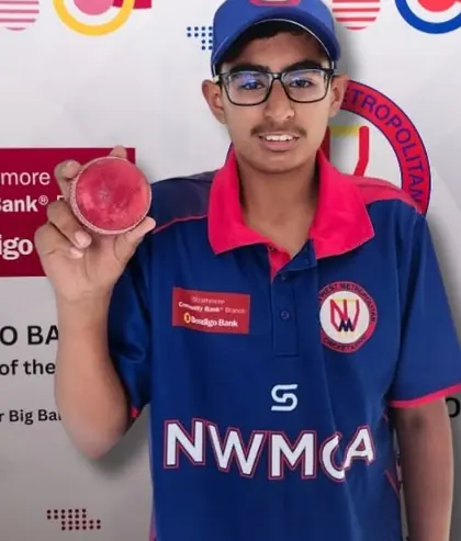 Upraj Kaura holding a cricket ball